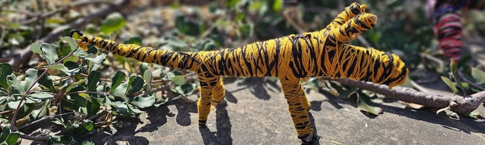 Create a bush animal out of natural fibres