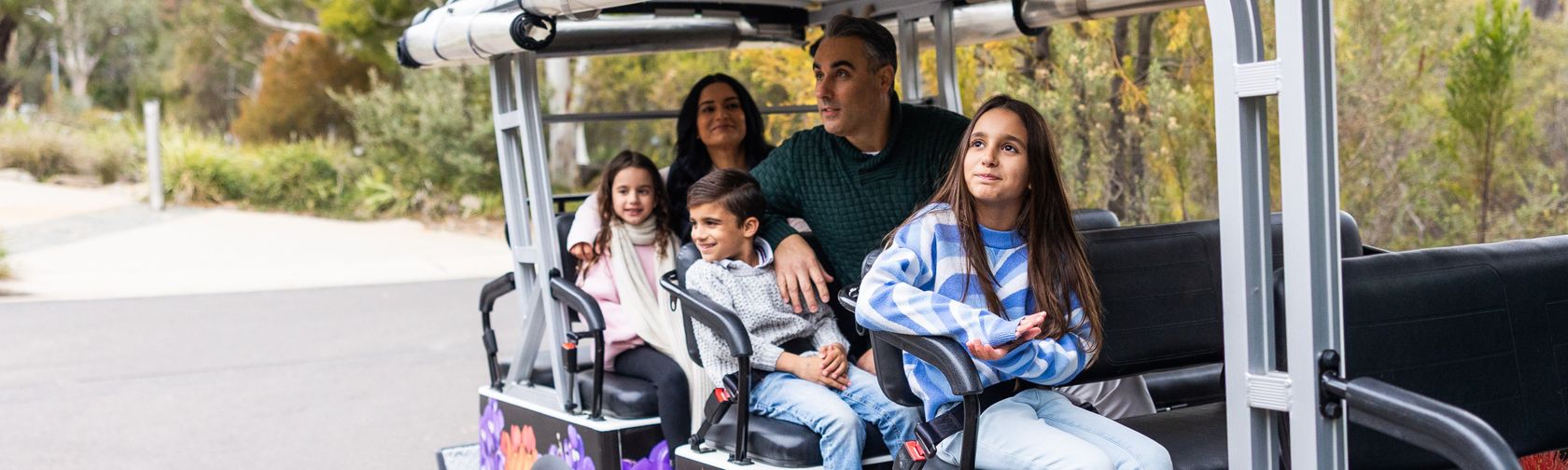 A family on the tour bus