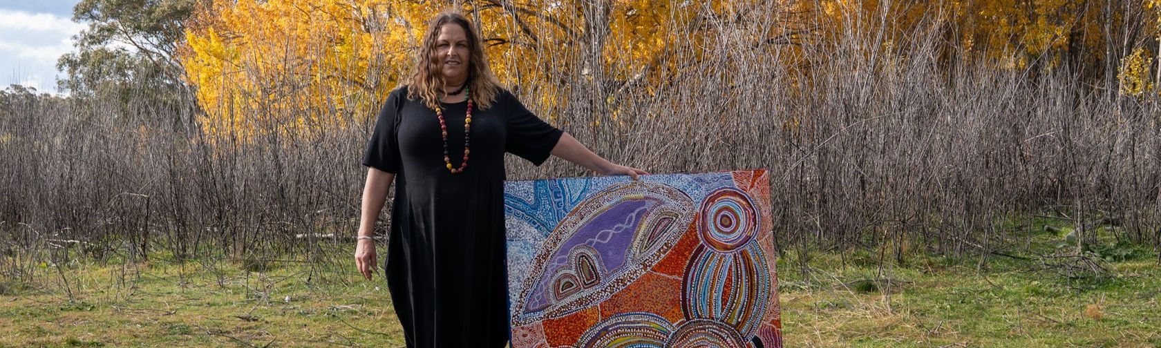 Gail Neuss pictured with artwork